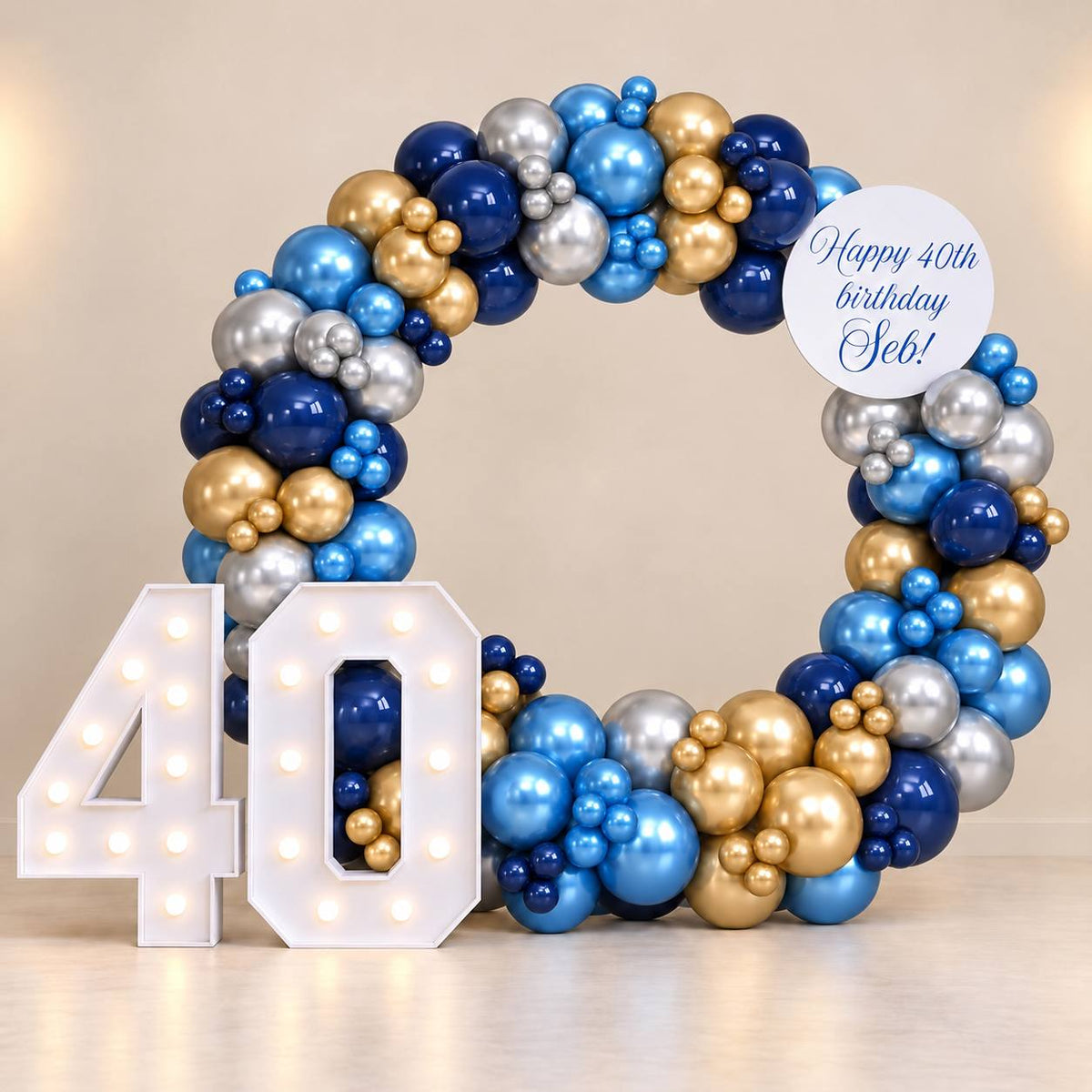 Royal Glow navy and gold ring balloon backdrop for a milestone birthday, DCCL Events Singapore