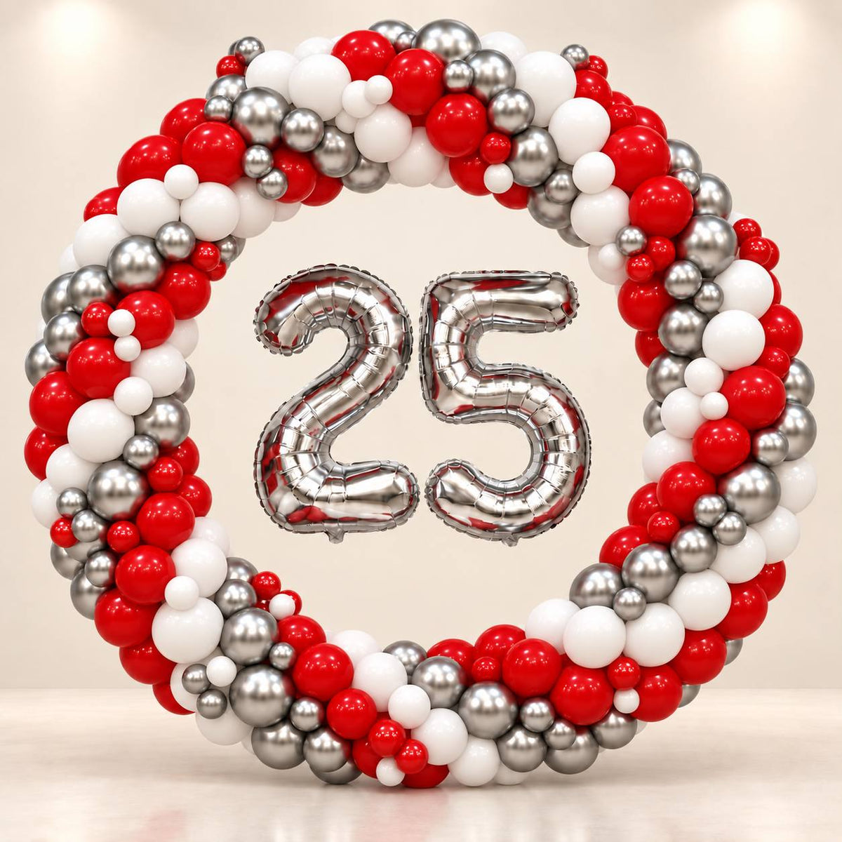Ruby Celebration red and silver ring balloon backdrop for a milestone birthday, DCCL Events Singapore