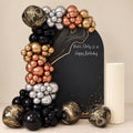 Velvet Noir black and gold balloon backdrop for a milestone birthday, DCCL Events Singapore